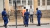 Police arrest a man following grenade attacks in the capital Bujumbura, Burundi Wednesday, Feb. 3, 2016.