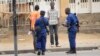 FILE - Police arrest a man following grenade attacks in the capital Bujumbura, Burundi Wednesday, Feb. 3, 2016.