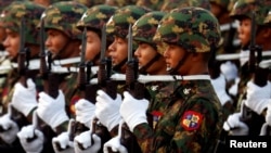 FILE - Myanmar's military parade to mark the 72nd Armed Forces Day in the capital Naypyitaw, Myanmar, March 27, 2017. 