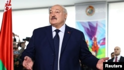 Belarusian President and presidential candidate Alexander Lukashenko visits a polling station during the presidential election in Minsk, Belarus Jan. 26, 2025.