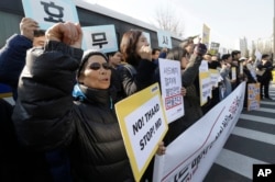 South Korean protesters stage a rally to oppose a plan to deploy an advanced U.S. missile defense system called Terminal High-Altitude Area Defense, or THAAD, in front of the Defense Ministry in Seoul, South Korea, Feb. 28, 2017.