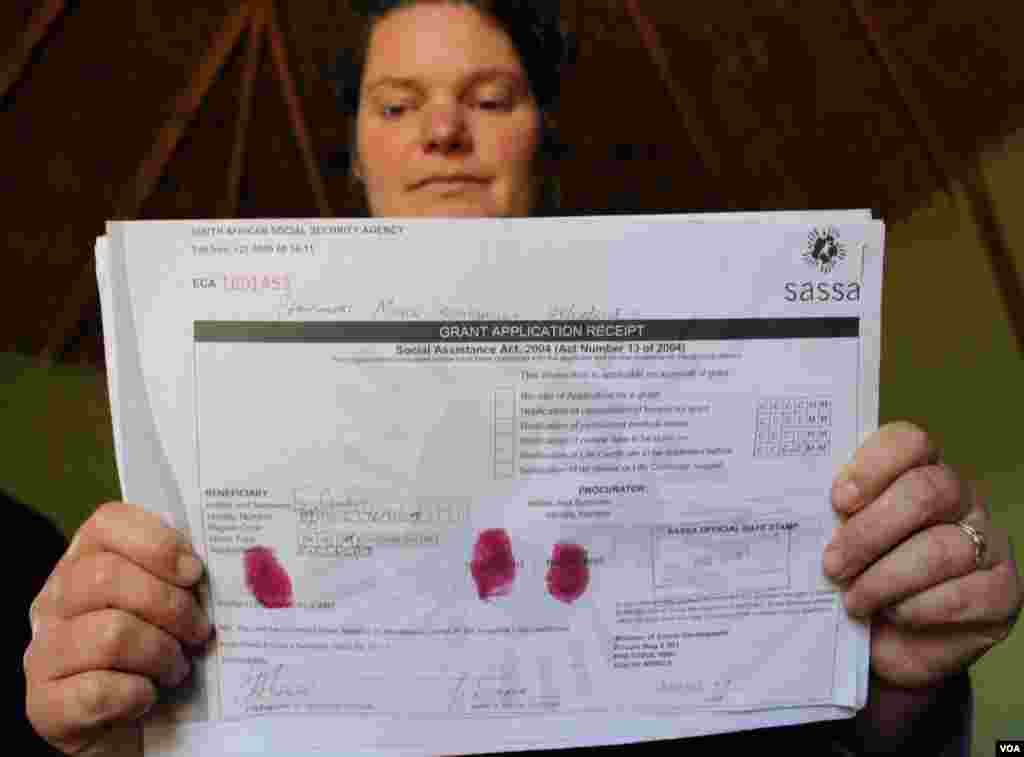 The home’s director, Alex Gunther, applies for disability grants on behalf of her patients and keeps meticulous records (VOA/Taylor)
