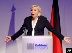 Far-right leader and candidate for next spring presidential elections Marine le Pen from France delivers a speech in Koblenz, Germany, Jan. 21, 2017.
