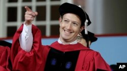 Facebook CEO and Harvard dropout Mark Zuckerberg on stage during Harvard University commencement exercises, Thursday, May 25, 2017, in Cambridge, Mass.