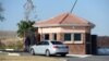FILE - A car carrying elders of the Mandela family is seen outside the former state president's home in Qunu on June 25, 2013. 