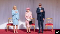 Jill Biden, primeira-dama dos Estados Unidos (esq), rainha Isabel II (cen) e Presidente Joe Biden (dir), Windsor, Reino Unido, 13 Junho 2021