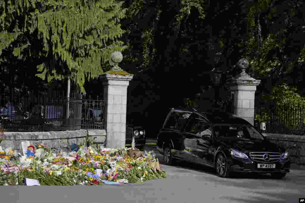 The coffin containing the body of Britain's Queen Elizabeth II leaves Balmoral Castle in Scotland, Sept. 11, 2022.