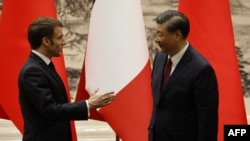 中國國家主席習近平在北京會晤到訪的法國總統馬克龍。（法新社2023年4月6日）