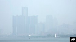 Smoke fills the sky reducing visibility, June 28, 2023, in Detroit. The Detroit area has some of the worst air quality in the United States as smoke from Canada's wildires spreads southward.