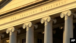 FILE - The Treasury Department is seen in Washington, Jan. 18, 2023. The U.S. on Feb. 14, 2024, sanctioned three people and four firms for allegedly helping to export goods and technology purchased from U.S. companies to Iran and its central bank.