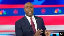 FILE - Sen. Tim Scott speaks during a Republican presidential primary debate in Miami, Florida, Nov. 8, 2023.