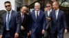 CEO Apple Tim Cook didampingi Menteri Komunikasi dan Informatika Budi Arie Setiadi dan Menteri Perindustrian Agus Gumiwang Kartasasmita di Istana Kepresidenan Jakarta, 17 April 2024. (Foto: REUTERS/Willy Kurniawan)