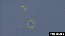 북한 서해 석도 인근 해상에서 선박 간 환적 정황(원 안)이 포착됐다. 사진=Planet Labs