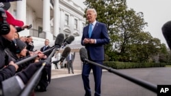 U.S. President Joe Biden speaks to members of the media before boarding Marine One on the South Lawn of the White House in Washington, Jan. 30, 2024. He underscored what he and his officials have repeatedly said — that Washington is not seeking more conflict in the Middle East. 