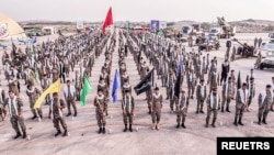 Anggota dari pasukan angkatan laut Korps Garda Revolusi Islam Iran (IRGC) berpartisipasi dalam latihan di pulau Abu Musa pada 2 Agustus 2023. (Foto: IRGC/WANA/Handout via Reuters)