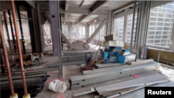 New York is making it easier to convert office buildings into residential spaces, as is being done with this structure in Manhattan, March 20, 2023.