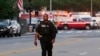A United States Secret Service officer stands outside the White House grounds, July 2, 2023 in Washington. The White House was briefly evacuated after the Secret Service discovered suspicious powder in a common area of the West Wing.