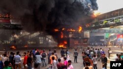 FILE - Anti-quota protesters clash with the police in Dhaka on July 18, 2024.