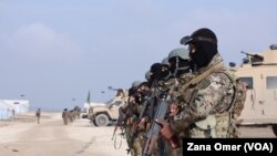 Şervanên HSD'ê li dema operasyonekê li nav kampa Holê (Wêne: arşîv).