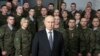 Presiden Vladimir Putin menyampaikan pesan Tahun Baru setelah kunjungan pejabat militer di Rusia, 31 Desember 2022. (Foto: Kremlin via AP)