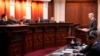 FILE - Attorney Eric Olson, far right, argues before the Colorado Supreme Court, Dec. 6, 2023, in Denver. The court on Dec. 19 declared former President Donald Trump ineligible for the White House under the U.S. Constitution’s insurrection clause.
