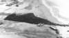 FILE - More than 1,000 sealed barrels containing radioactive soil near Palomares in Spain on March 18, 1966, where H-bombs fell and broke open. The soil is to be taken to the U.S., atomic energy commission's 'Burial Ground' near Aiken, South Carolina, for disposition.