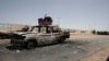 Destroyed military vehicles are seen in southern in Khartoum, Sudan, April 20, 2023. 