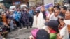 Veteran Sherpa guide Kami Rita, center, arrives at the airport in Kathmandu, Nepal, May 25, 2023, after scaling Mount Everest for the 28th time. 
