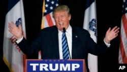 FILE - Donald Trump, then a Republican candidate for the U.S. presidency, speaks during a campaign stop in Council Bluffs, Iowa, Dec. 29, 2015. 