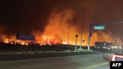 This image obtained from the County of Maui in Hawaii, shows the wildfire that spead to Lahaina, on Aug. 9, 2023. (County of Maui via AFP)
