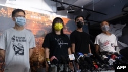 FILE - The Hong Kong Alliance in Support of Patriotic Democratic Movements of China standing committee members, from left, Tang Ngok Kwan, Chow Hang-tung, Simon Leung Kam-wai and Tsui Hon Kwong attend a press conference in Hong Kong on Sept. 5, 2021.