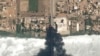 This satellite photo by Planet Labs PBC shows fires burning near a hospital in Khartoum, Sudan, April 16, 2023. 