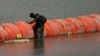 Court Lets Texas Keep Rio Grande Barriers in Place for Now