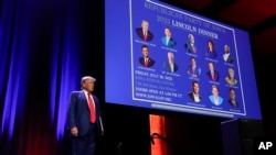 FILE - Republican presidential candidate former President Donald Trump arrives to speak at the Republican Party of Iowa's 2023 Lincoln Dinner in Des Moines, Iowa, July 28, 2023.