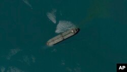 This satellite image from Planet Labs PBC shows the seized oil tanker Niovi off the coast of Bandar Abbas, Iran, May 6, 2023. (Planet Labs PBC via AP)