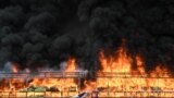 A burning pile of seized illegal drugs is seen during a destruction ceremony to mark the 'International Day against Drug Abuse and Illicit Trafficking' in Yangon on June 26, 2023. 