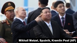 Russian President Vladimir Putin, left, and North Korean leader Kim Jong Un examine a launch pad at the Vostochny cosmodrome, about 200 kilometers (125 miles) from Blagoveshchensk, Russia, Sept. 13, 2023. (Mikhail Metzel, Sputnik, Kremlin Pool Photo via AP)