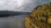 FILE - A vessel transports supplies along the Yenisei River from St. Petersburg through the Arctic Ocean to a hydroelectric power station outside Krasnoyarsk, Siberia, Russia, Sept. 19, 2017. Many experts are watching China’s arctic activities, with a likely focus on Russia.