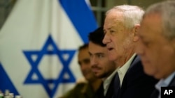 FILE - Israeli War Cabinet member Benny Gantz, second right, meets with U.S. Secretary of State Antony Blinken in Tel Aviv, Israel, Feb. 8, 2024