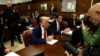 Former President Donald Trump awaits the start of his criminal trial at Manhattan criminal court in New York, May 6, 2024. 