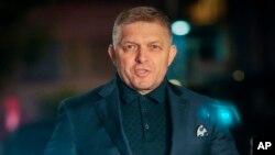 Former Prime Minister Robert Fico arrives to his party's headquarters after polling stations closed for an early parliamentary election, in Bratislava, Slovakia, Sept. 30, 2023. 