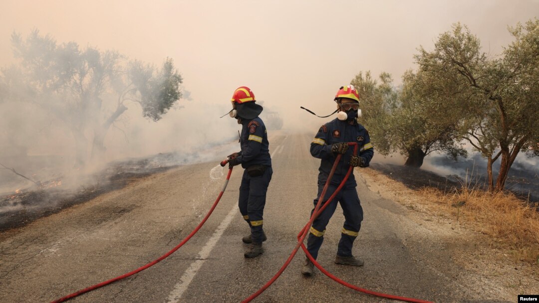 Firefighters battle a wildfire raging in Alexandroupolis, in Greece's Evros region, Aug. 22, 2023.