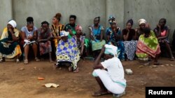 Relatives of followers of a Christian cult called Good News International Church, gather outside the mortuary in Malindi, Kilifi county, Kenya, April 27, 2023
