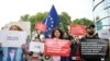 Demonstrators gather outside the Biltmore Hotel in Tbilisi, Georgia, to denounce the 'Russian Law' on May 3, 2024. 
