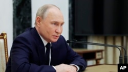FILE - Russian President Vladimir Putin holds a meeting on development of Russia's military industrial complex, at the Kremlin in Moscow, May 15, 2024. (Gavriil Grigorov, Sputnik, Kremlin pool photo via AP)