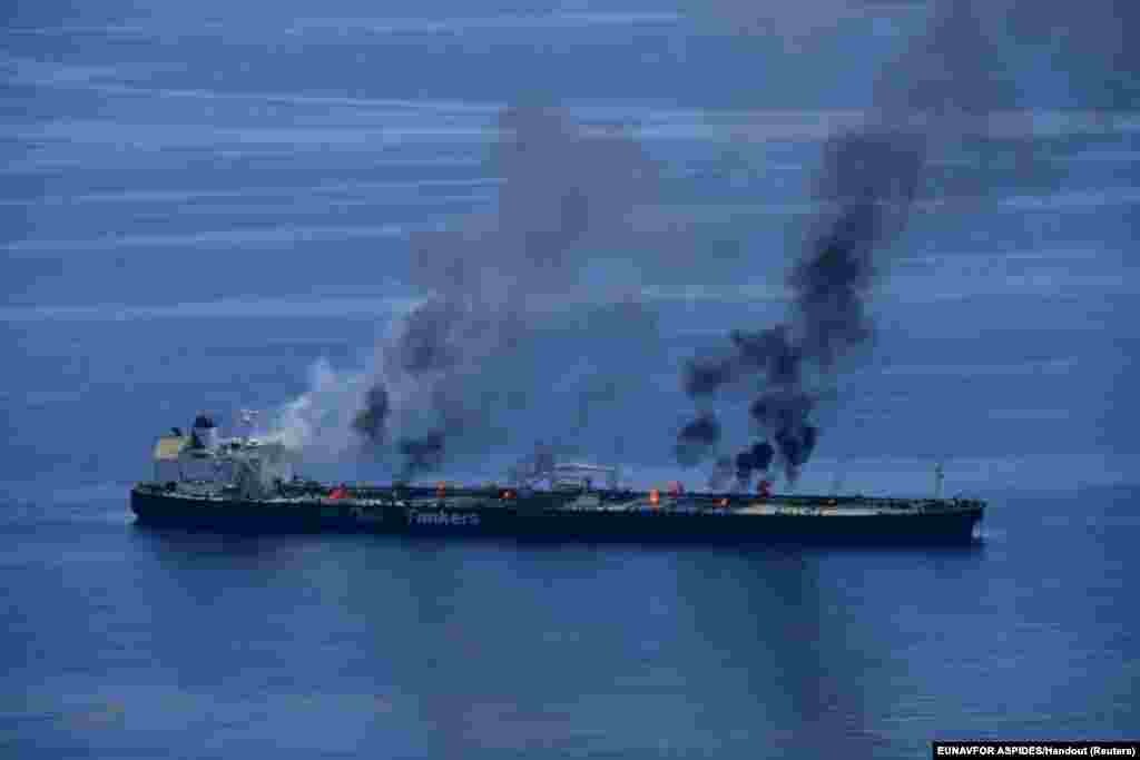 Flames and smoke rise from the Greek-flagged oil tanker Sounion, which has been on fire since August 23, on the Red Sea, Aug. 25, 2024. Yemen's Houthis said they attacked the Sounion in the Red Sea. 