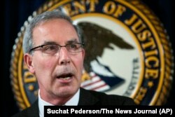 FILE - U.S. Attorney David Weiss speaks during a press conference, in Wilmington, Delaware, on May 3, 2018.