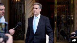 Michael Cohen leaves his apartment building on his way to Manhattan criminal court in New York City, May 14, 2024. 
