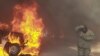 Protesters in southern Mexico torch government building and 12 vehicles 