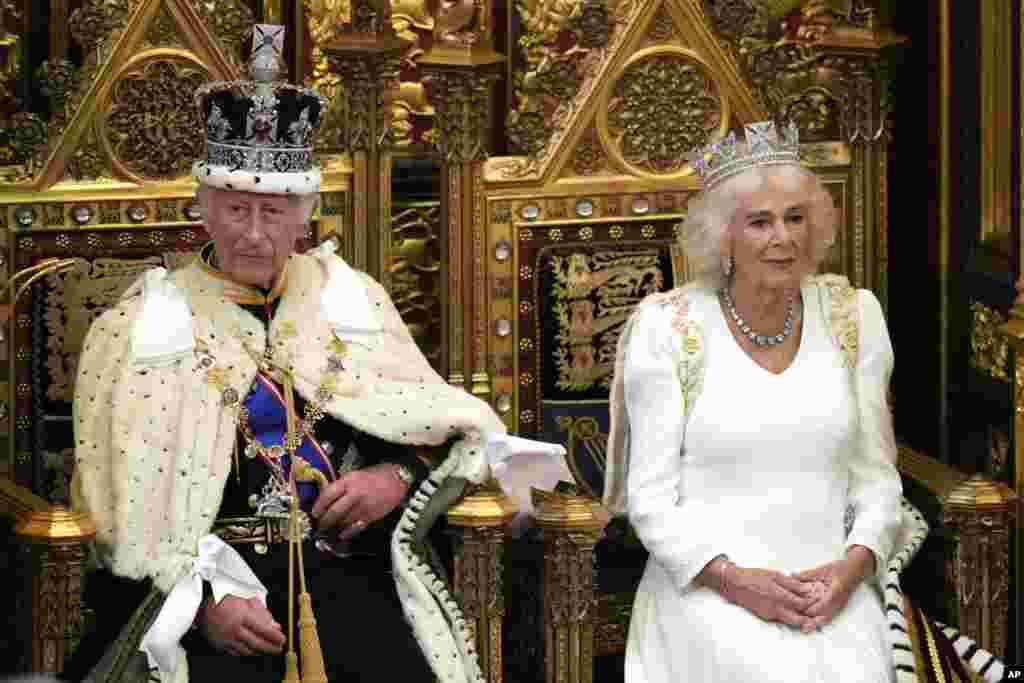 King Charles III waits to read the King's Speech, as Queen Camilla sits next to him during the State Opening of Parliament in the House of Lords, London. His speech will set out the agenda of the UK's first Labour government for 14 years.
